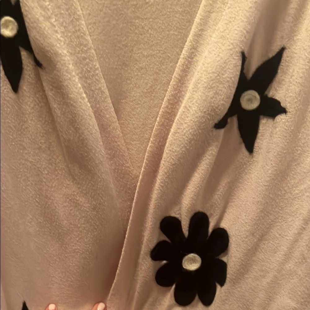 Elegant Cream Sweater with Black Floral Accents